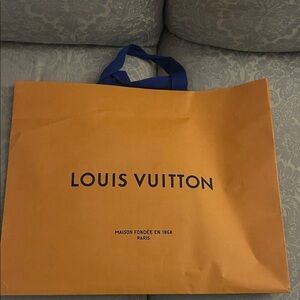 Louis Vuitton Bold Orange Bag with Blue Handles